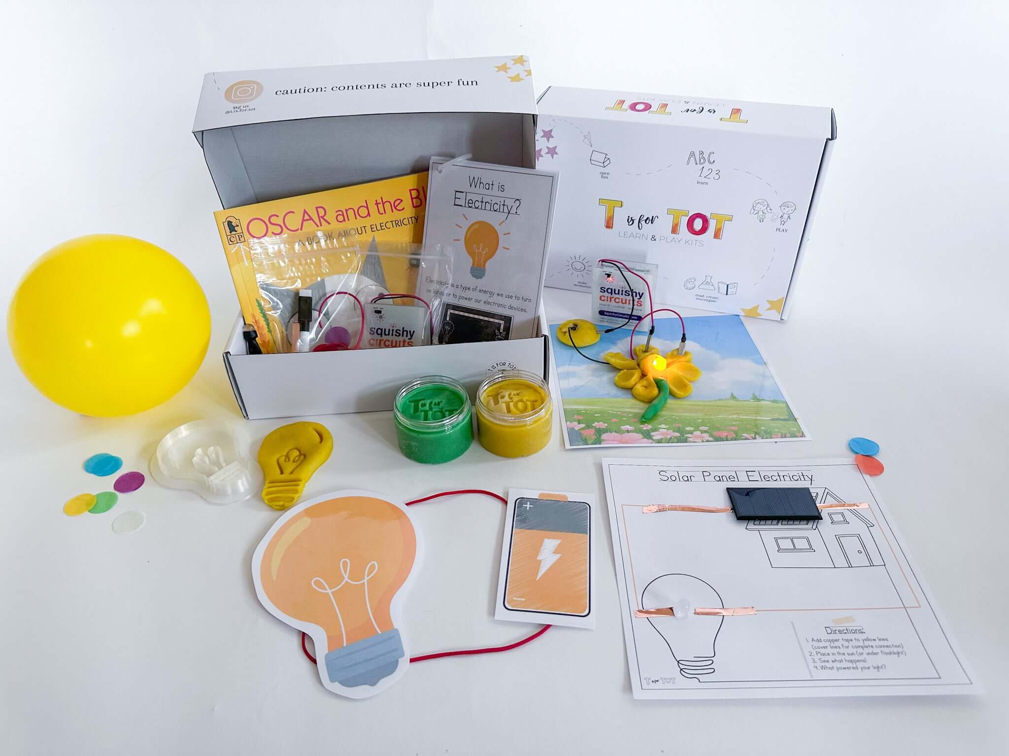 Electricity experiment kit for kids with Squishy Circuits battery pack and light. Comes with homemade playdough, lightbulb playdough cutter, and experiments to understand static and solar electricity. Includes 